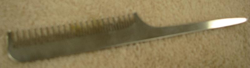 Swedish Tail Comb - Light and easy to use for ratting tail hair. Aluminum construction. Tooth area: 3-3/4". Overall length: 8".