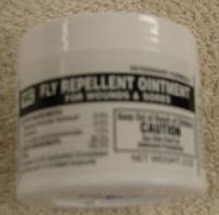 Fly Repellant Ointment 2 oz. for Wounds - Repels and kills house flies, stable flies, face flies and horn flies, and discourages infection. Provides long-lasting protection for fast healing. For use on horses, ponies and dogs. Contains pyrethrins 0.2%, piperonyl butoxide technical 0.5%, and di-n-propyl isocinchomeronate 1%. Okay for use on superficial wounds.